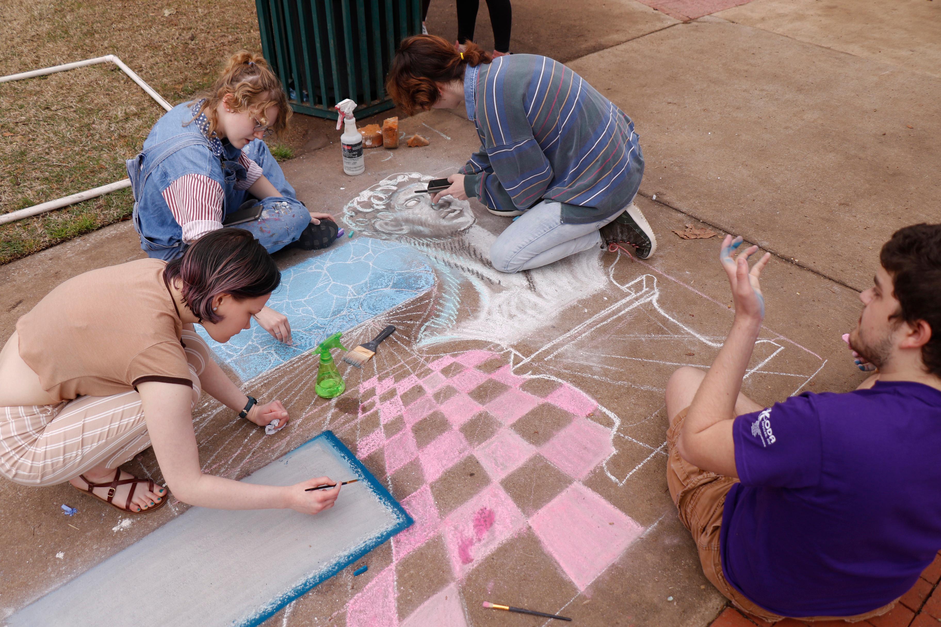 Students working on chalk art