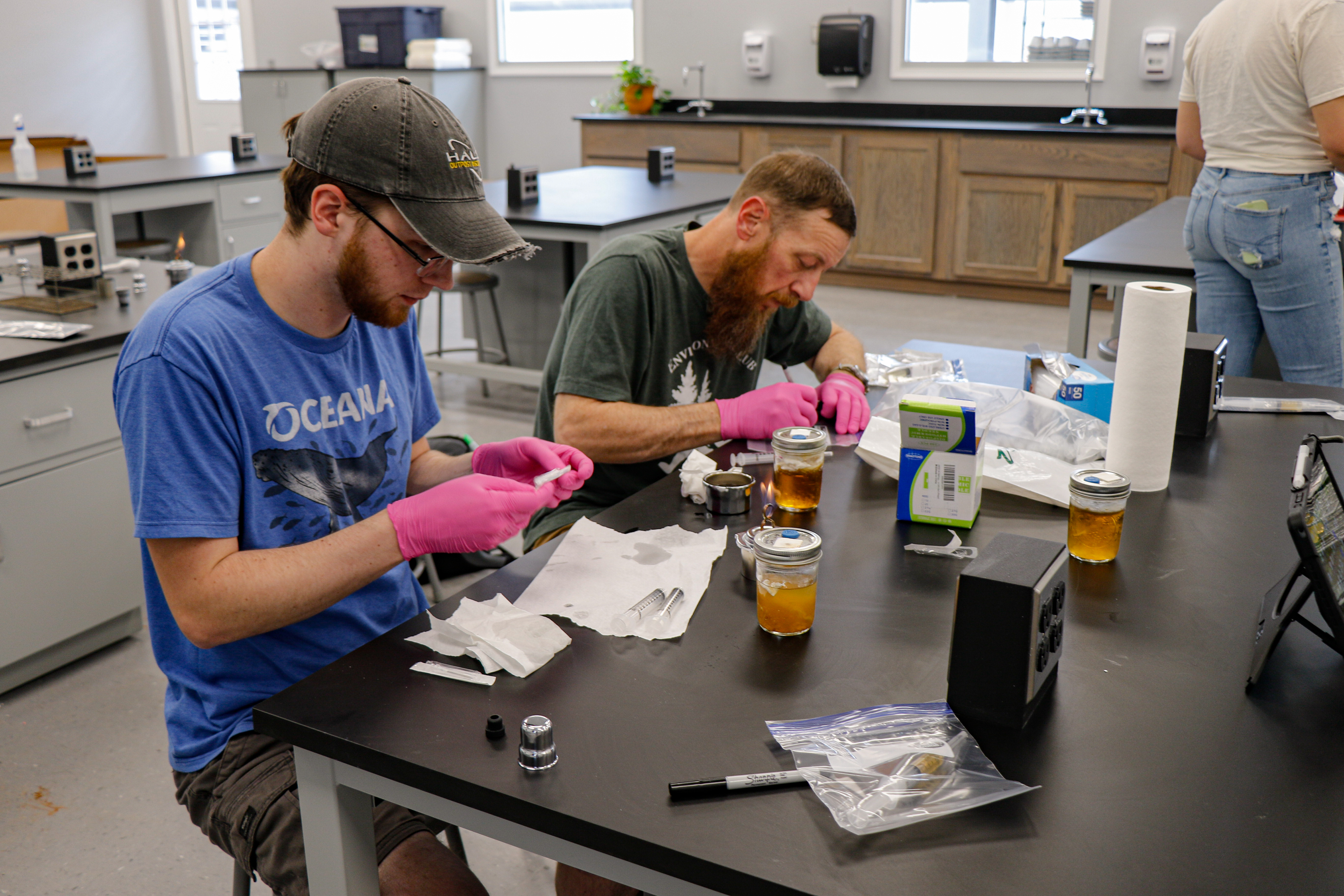 Two students working on a lab assignment.