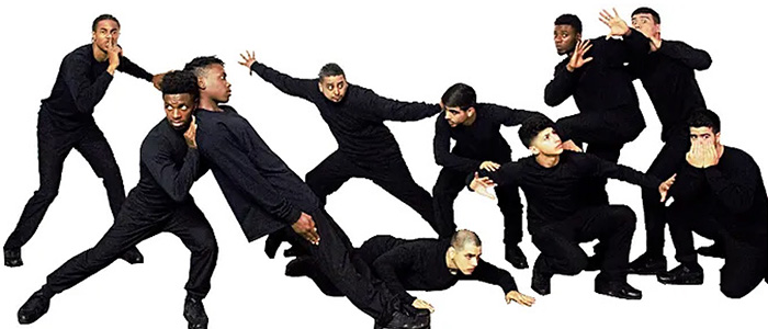 A group of men dressed in all black, making various stylized poses