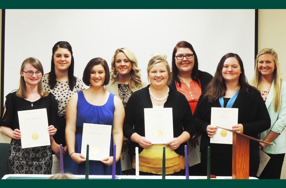 Eight initiated into education honor society