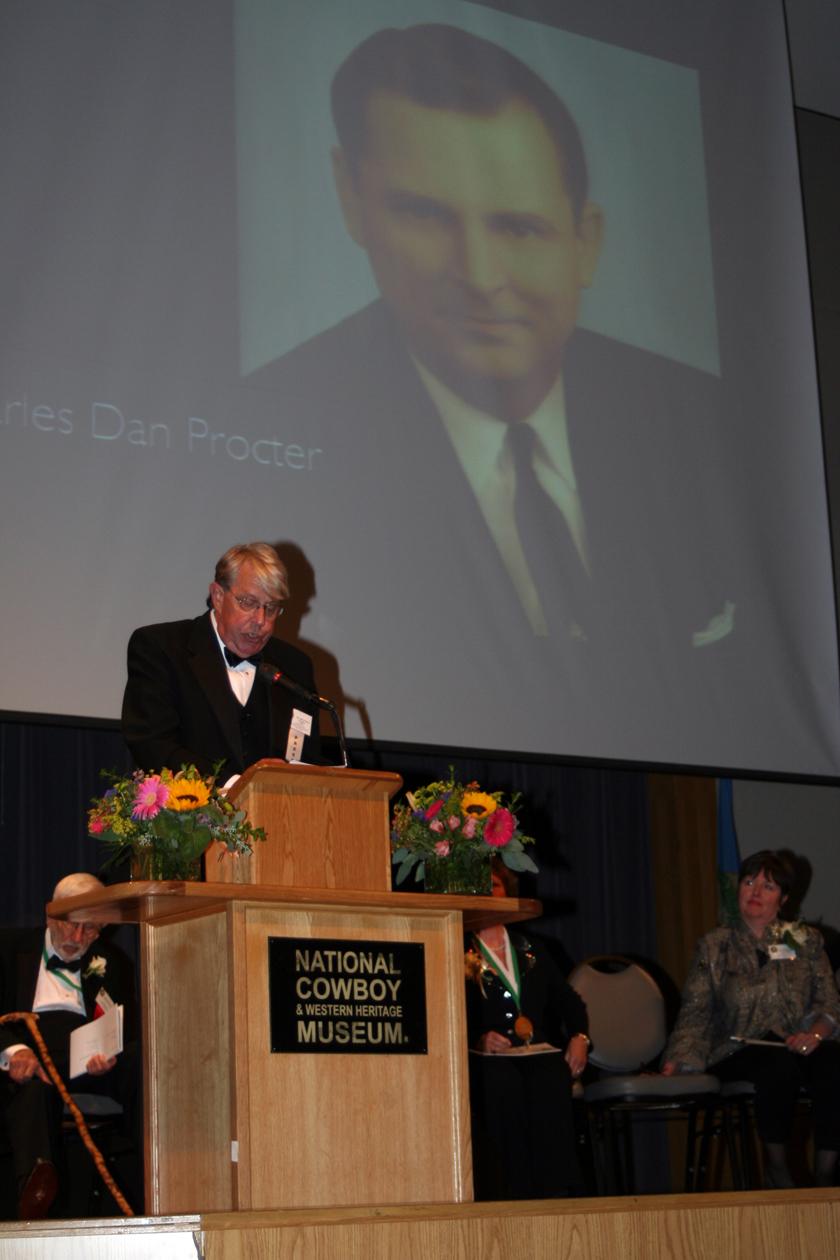 Feaver Accepts Award for OCW President Dan Procter