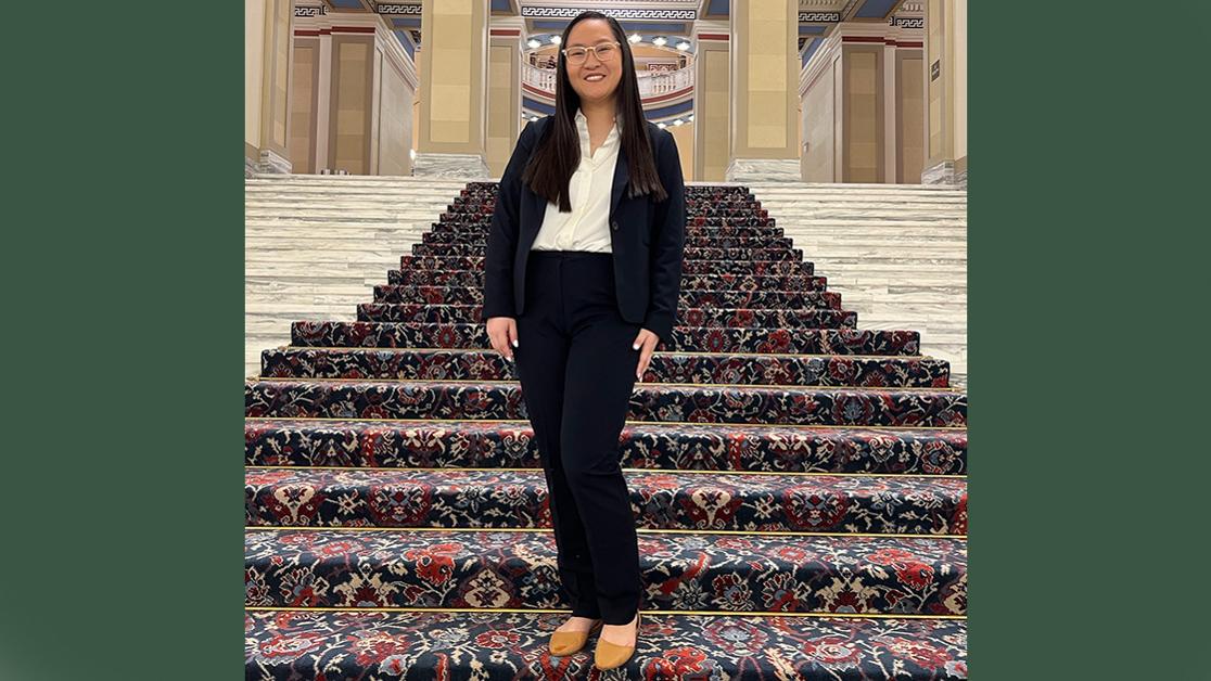 A photo of USAO student Halli Humphrey on the inside steps of the Oklahoma state capitol