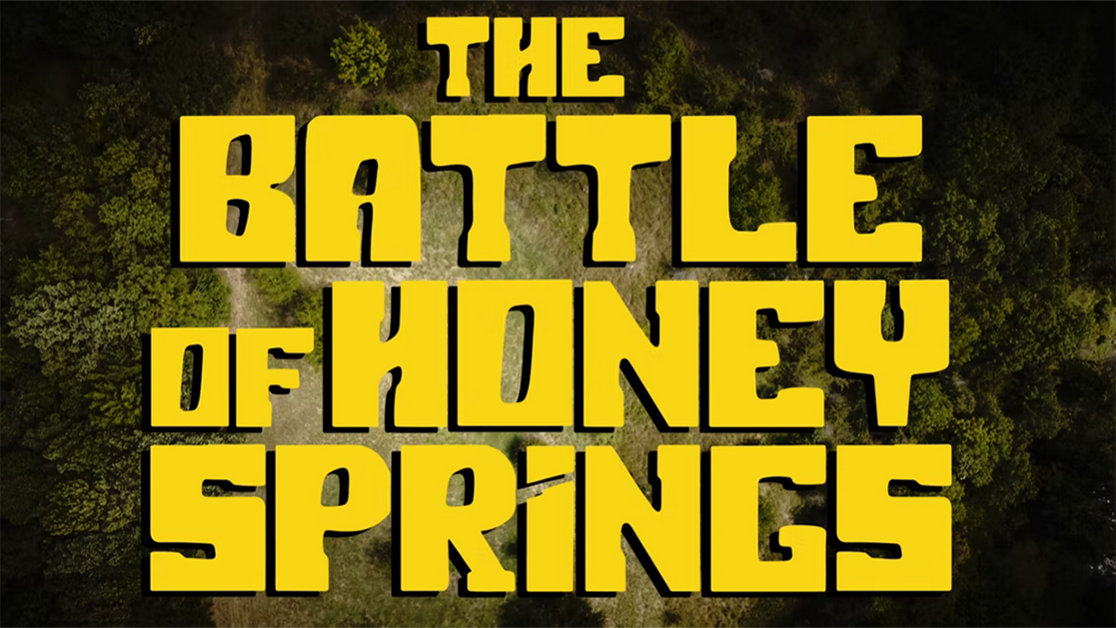 Titleboard for the Battle of Honey Springs documentary featuring those words in bold yellow font