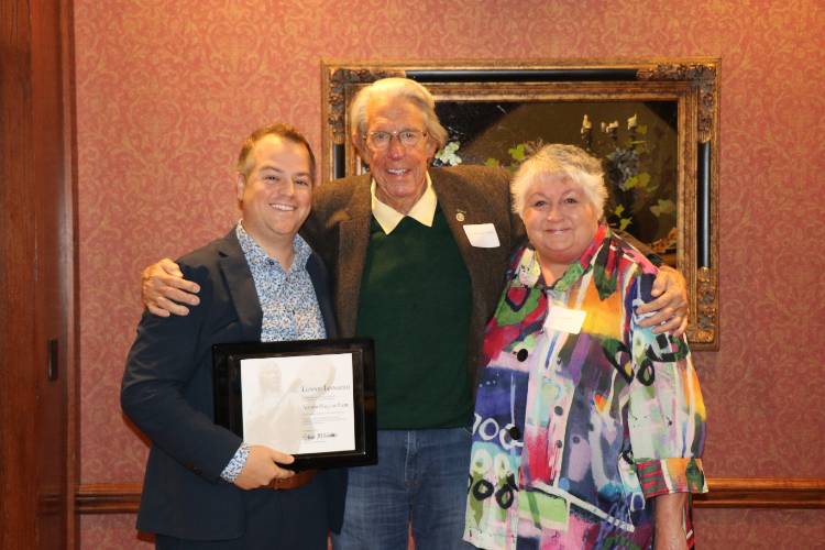 Hall of Fame inductee Lonnie Iannazzo stands of the far left with President John Feaver in the middle and Dr. JC Casey on the far right at the 2022 Alumni Hall of Fame Brunch. 