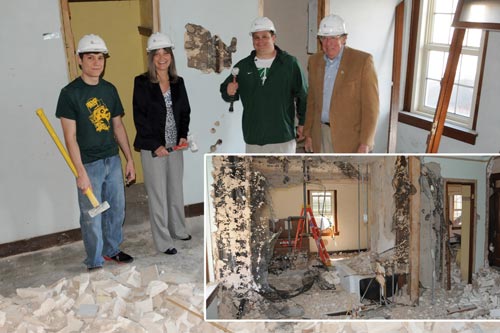 Students and president John Feaver breaking ground at construction site