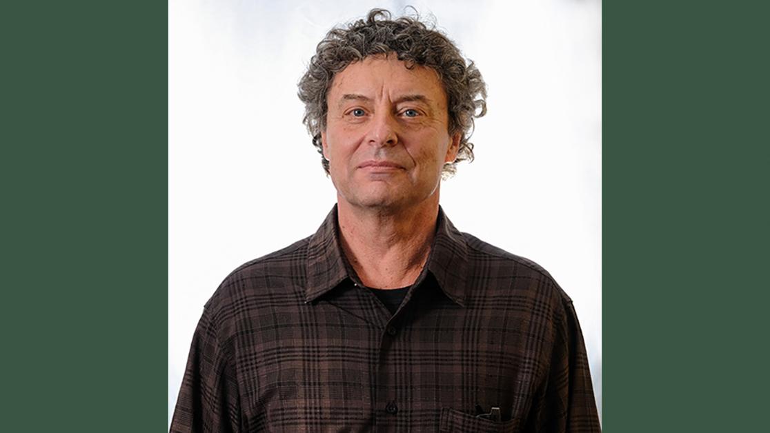 A headshot of Dr. Stephen Weber against a white backdrop